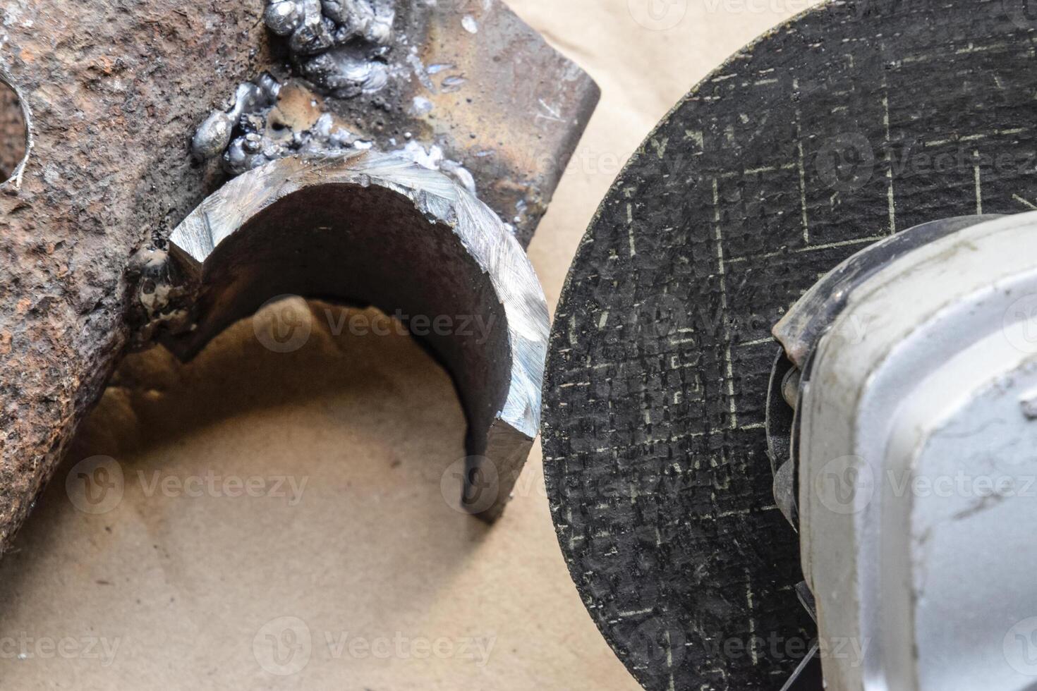 disk Angle grinder. Tool for working with metal. The working disk. detail, polished by the Bulgarian. photo