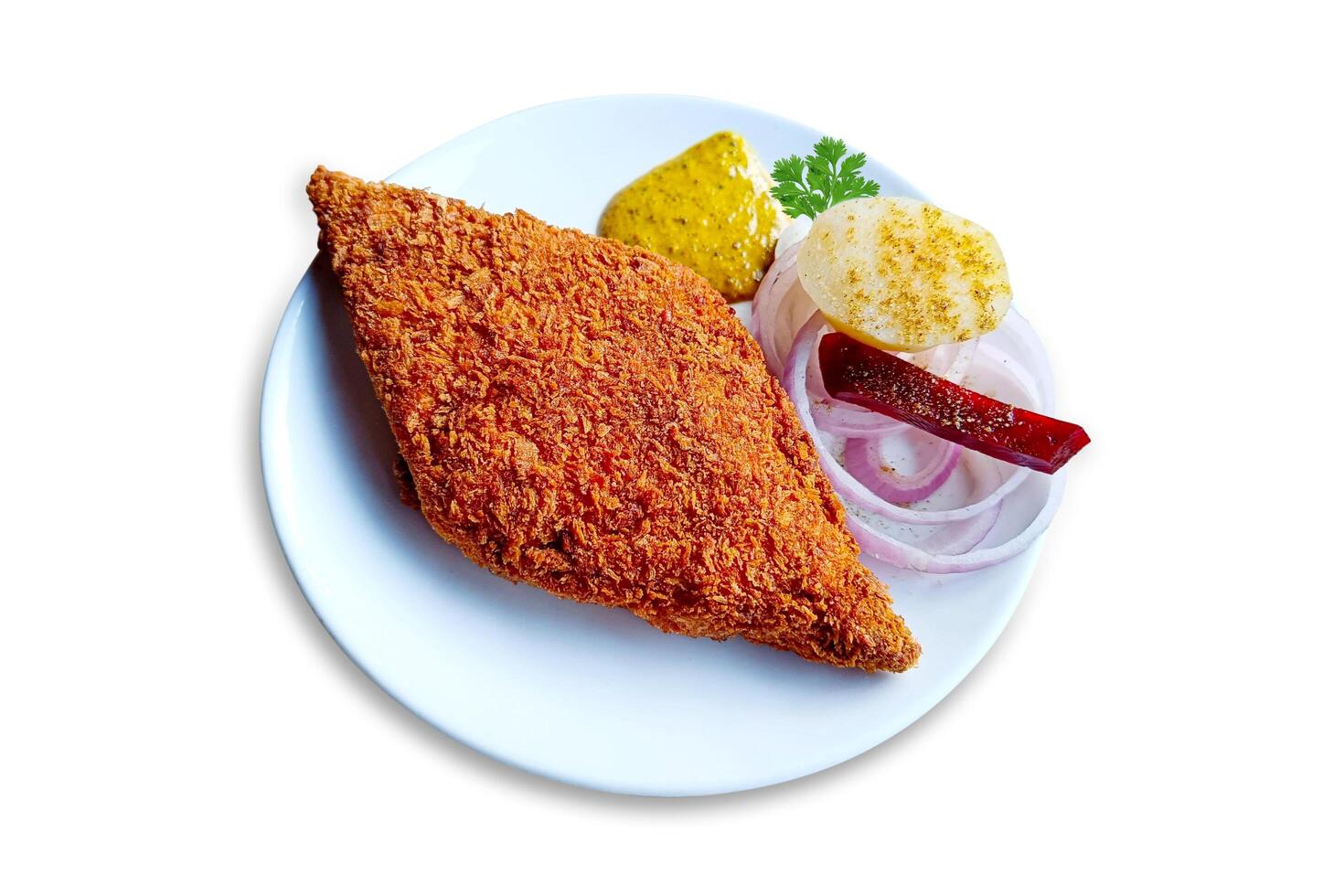 Fish Cutlet. Fish Fry served with sauce, onion, and potato on a white plate. sea fish. Fowl Cutlet photo