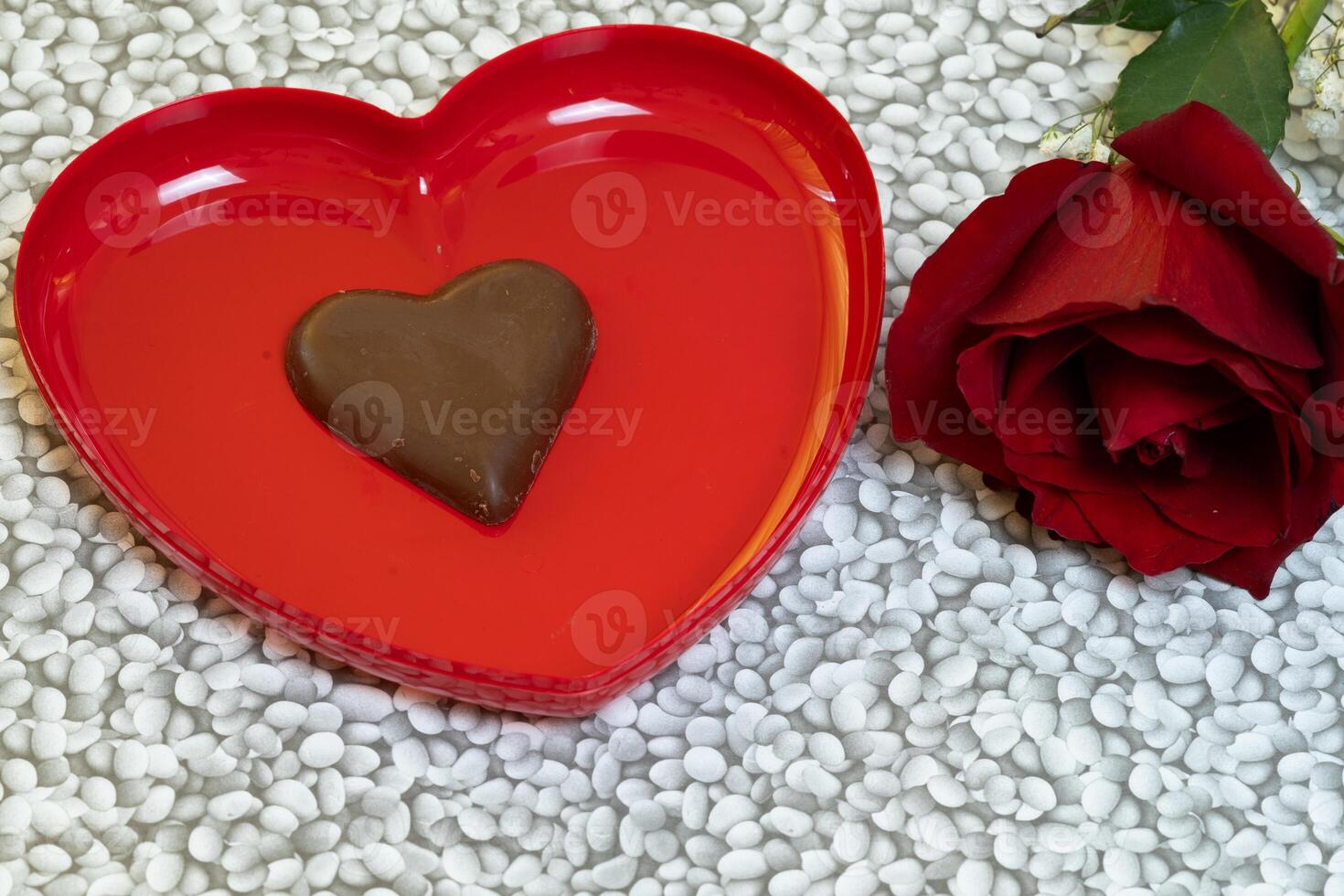 big heart and chocolate with a red rose valentines day photo