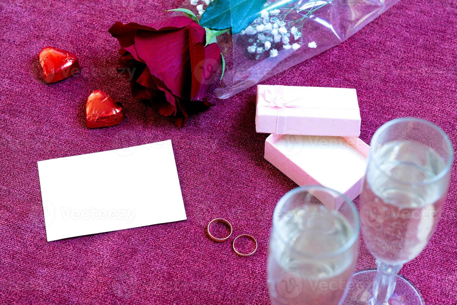 valentines day champagne rings chocolates and flowers photo