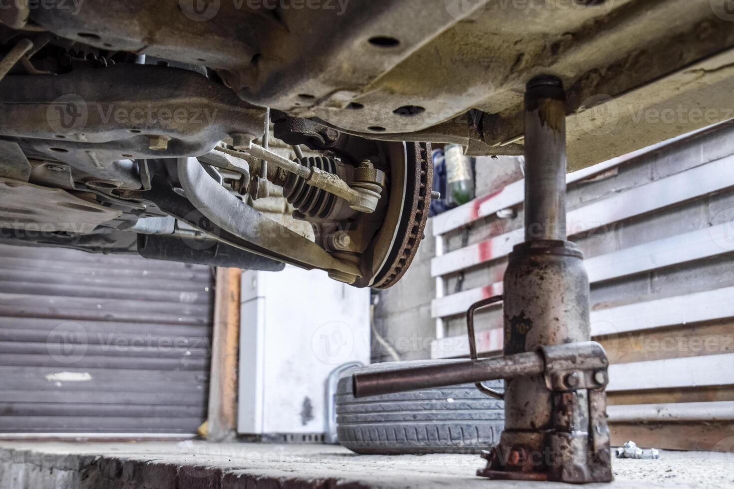 Forged car for a hundred. Car repair. Car view from below photo