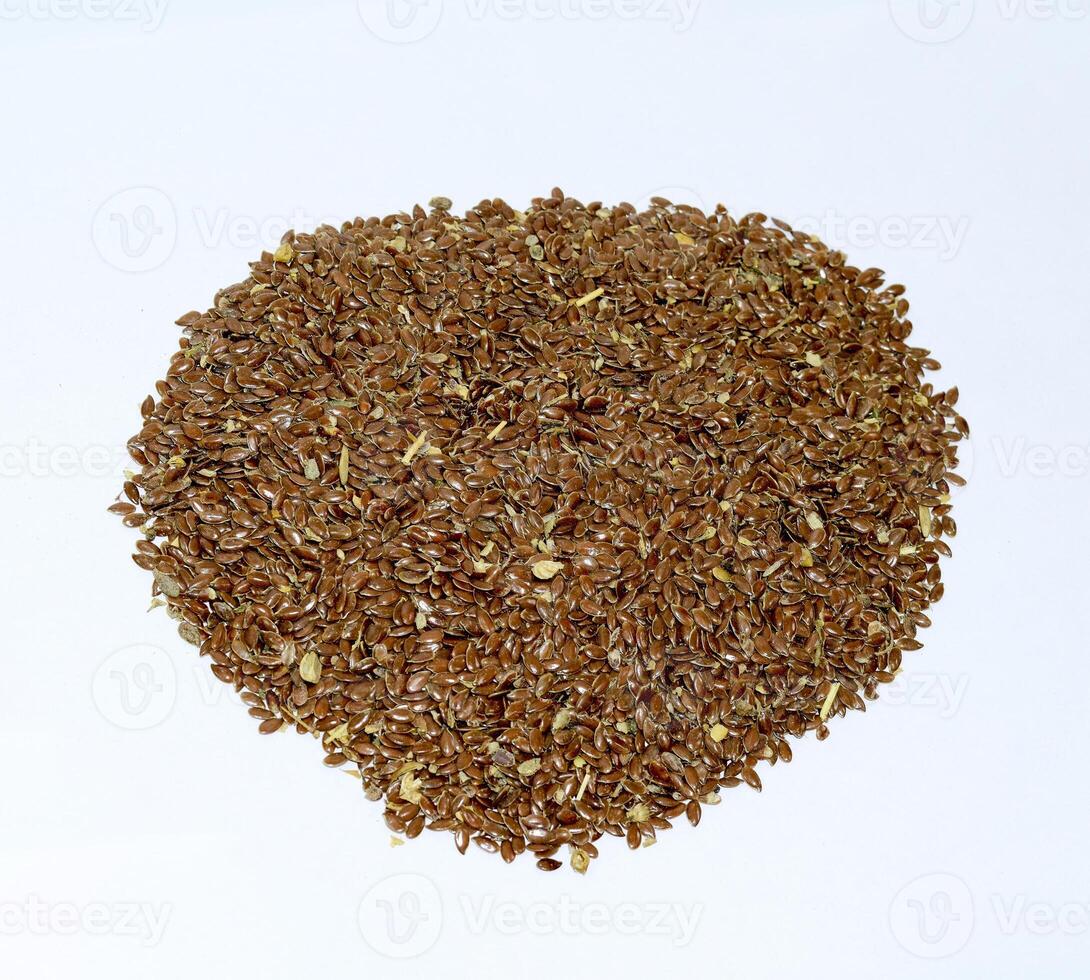 Flax seeds. Storage of flax seeds. Flax, essential oil culture. A handful of flax seeds. photo