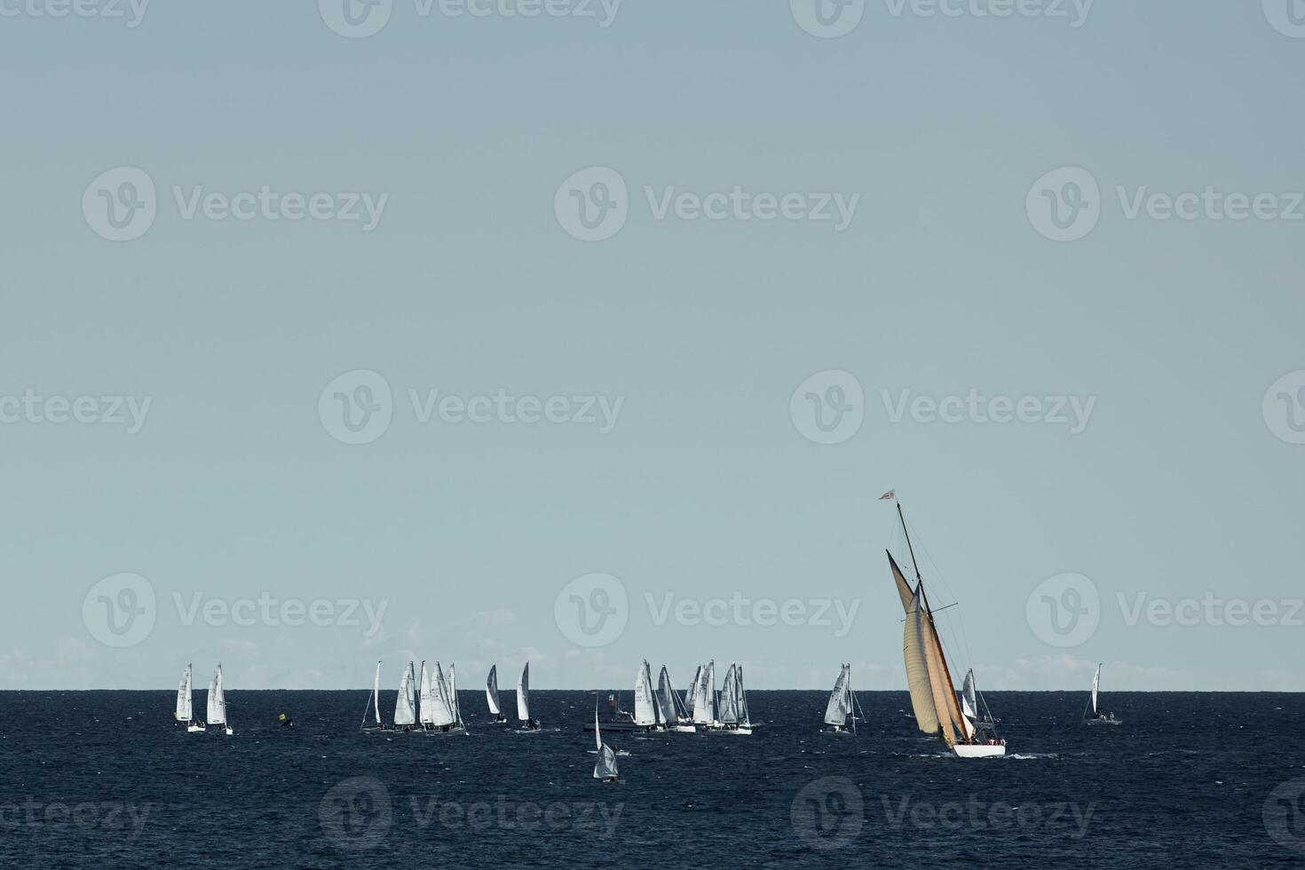 A lot of sail boats and yachts in the sea went on a sailing trip near port Hercules in Monaco, Monte Carlo, sail regatta, race photo