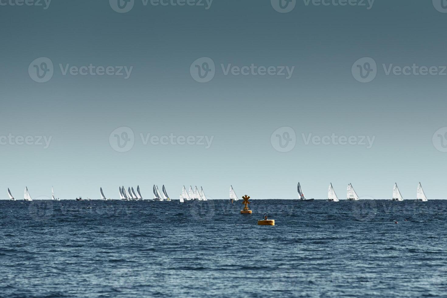 A lot of sail boats and yachts in the sea went on a sailing trip near port Hercules in Monaco, Monte Carlo, sail regatta, race photo