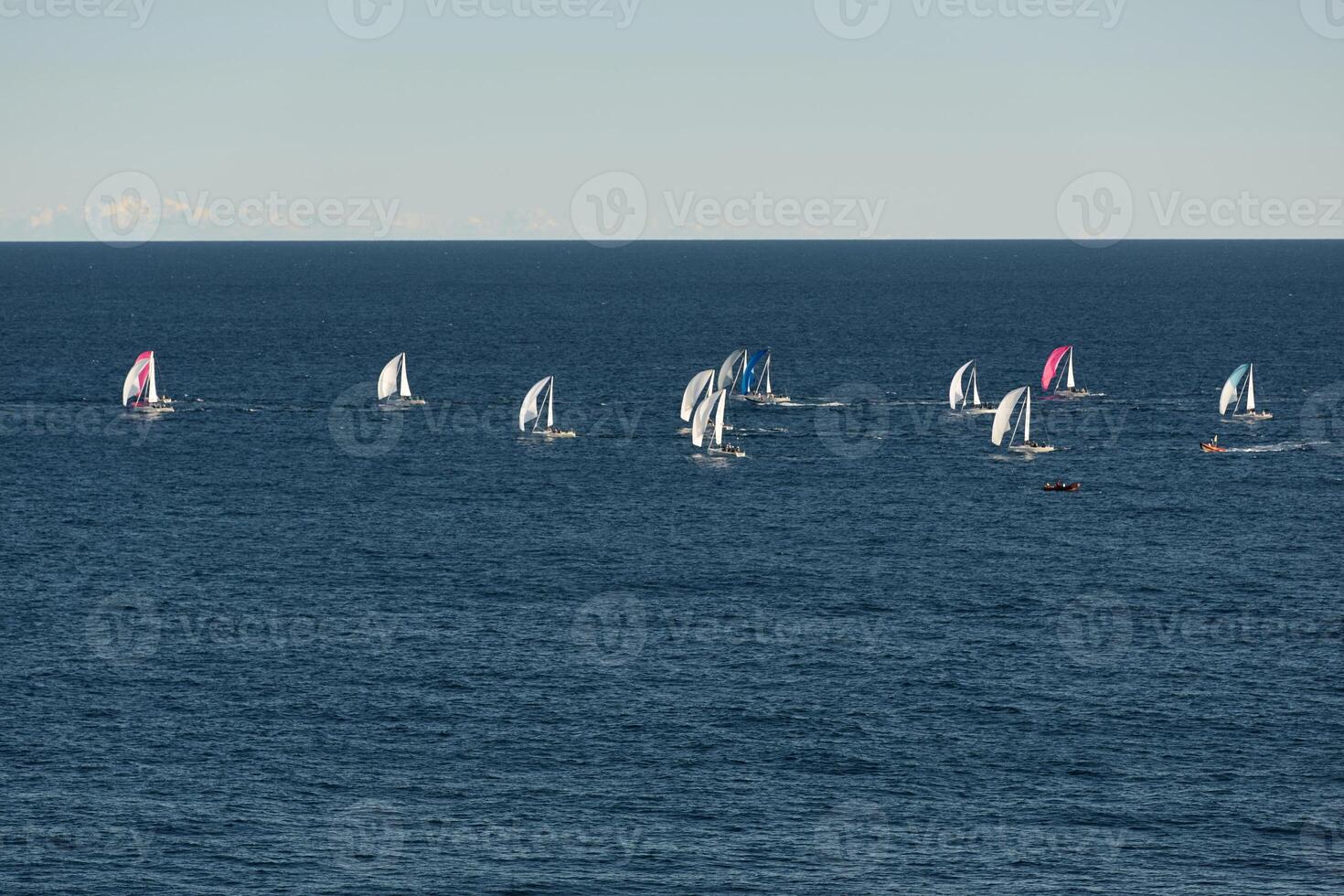 A lot of sail boats and yachts in the sea went on a sailing trip near port Hercules in Monaco, Monte Carlo, sail regatta, race photo