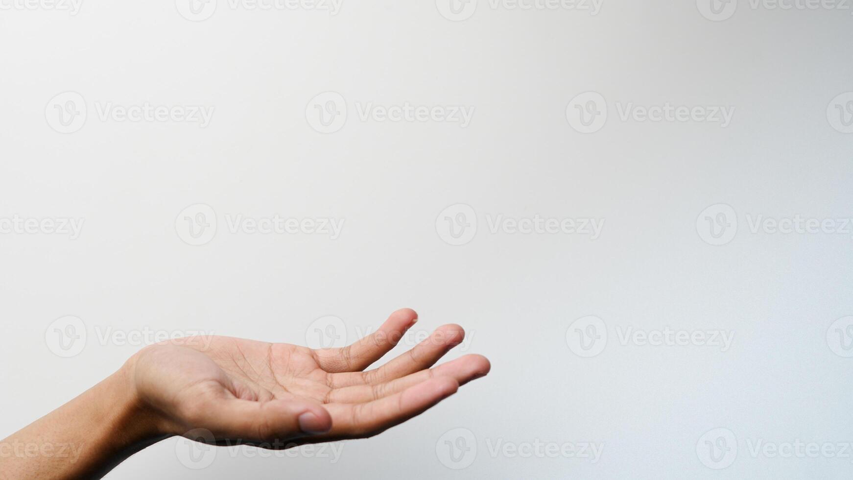 del hombre mano con un gesto preguntando para dinero en un blanco antecedentes foto