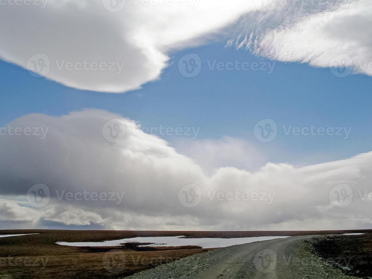 Road in the tundra in early autumn photo