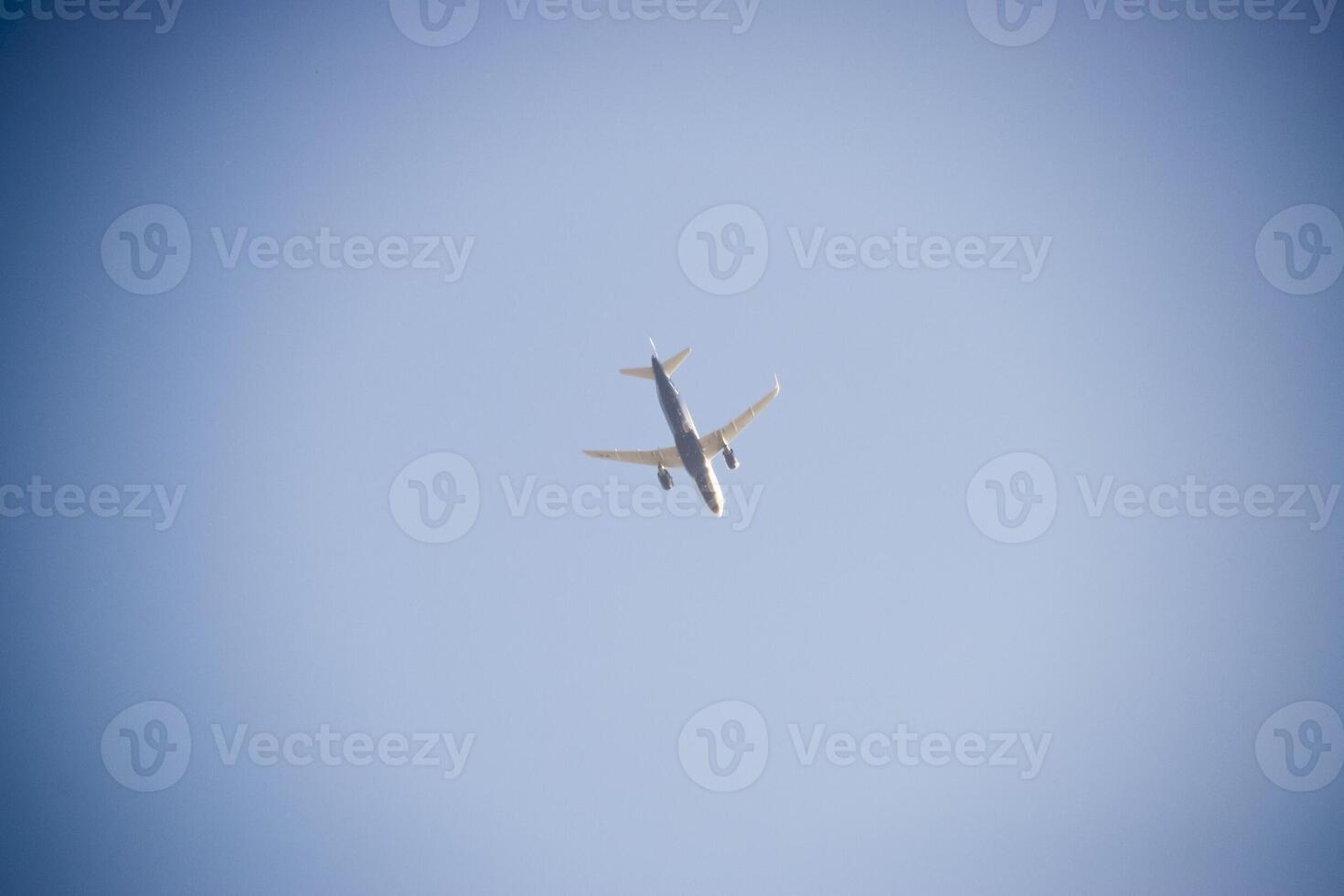 Passenger aircraft in the sky at low altitude flies to the airport to land. photo