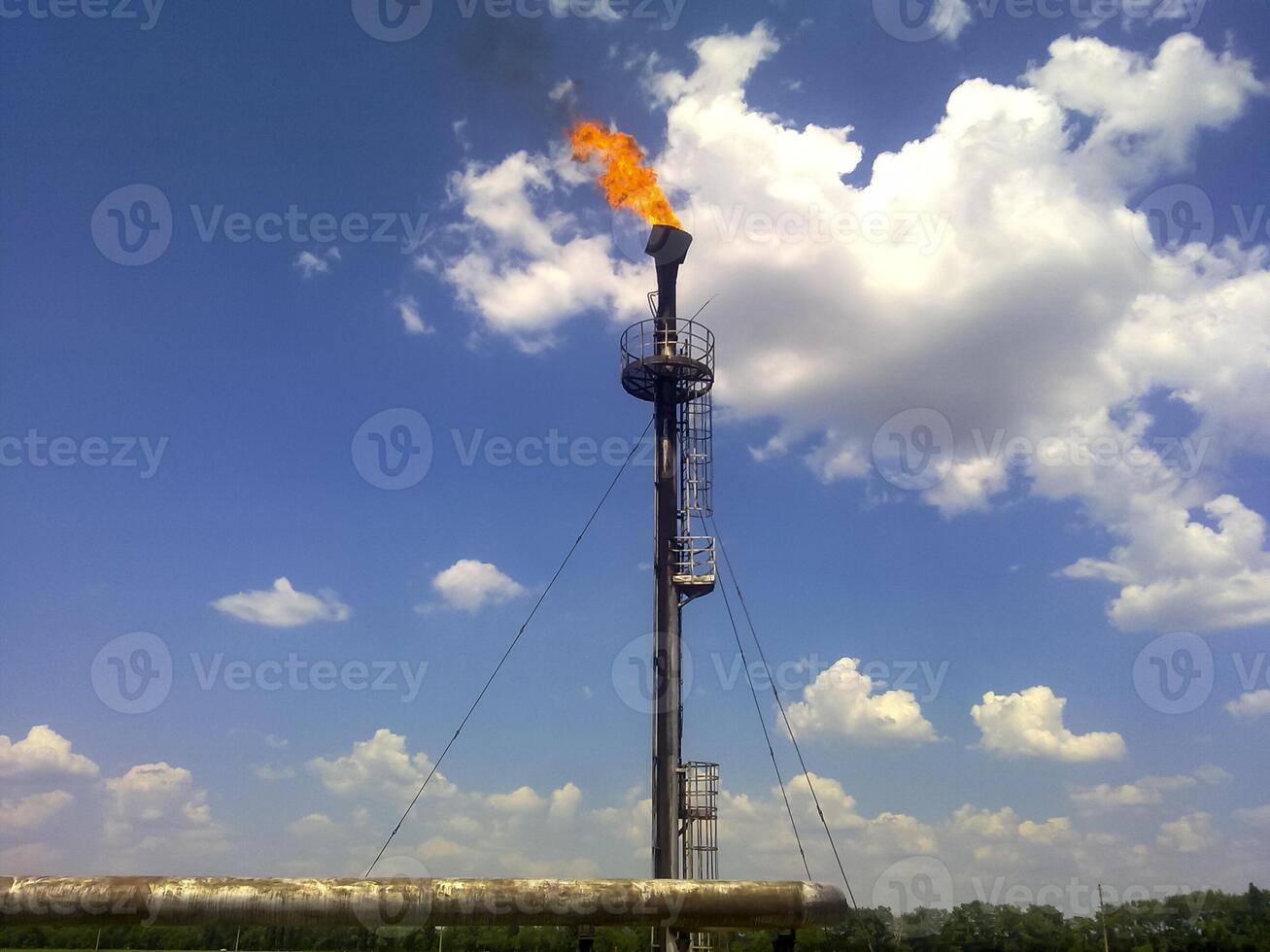 Flare for flaring associated gas. The end point of the pressure relief system on the oil facility. photo