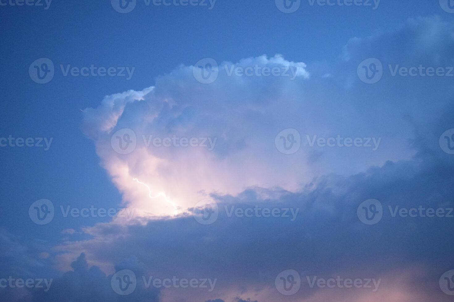 Lightnings in storm clouds photo