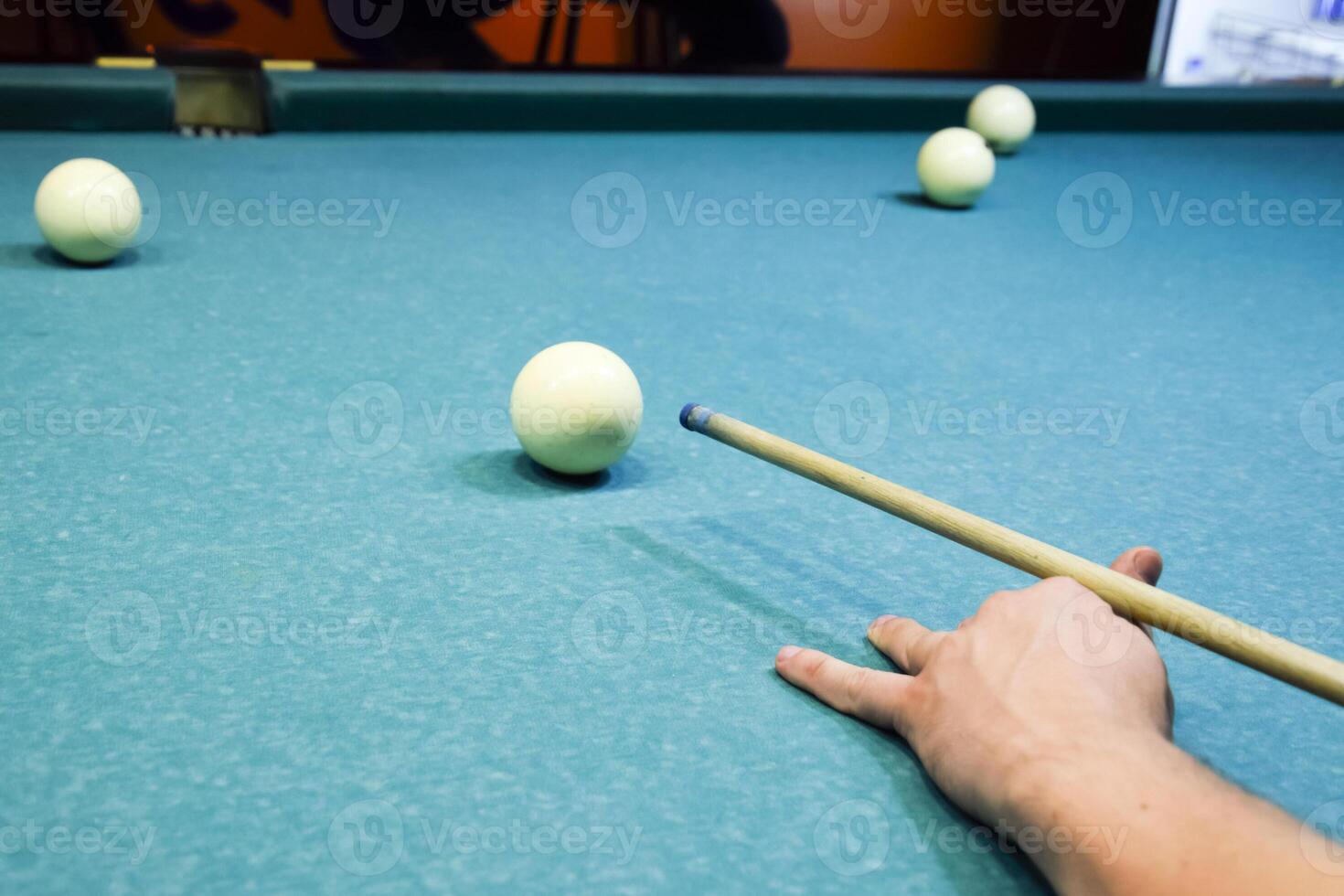 Billiards, billiard table. Targeting the cue in the ball for imp photo