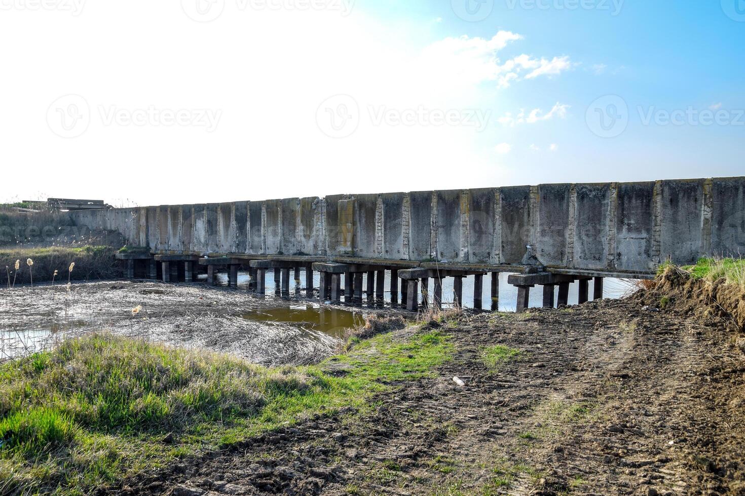 Canal irrigation system rice fields. Concrete tunnel for irrigation canal. photo