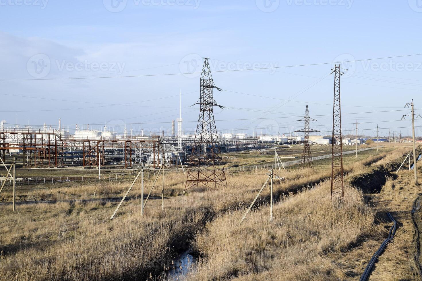 Distillation columns, pipes and other equipment furnaces refinery. photo