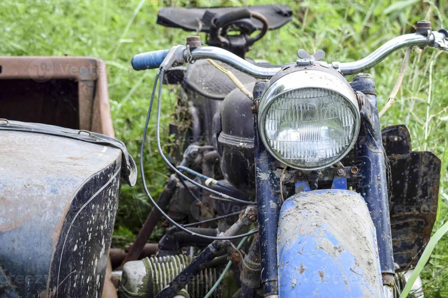 Old Soviet motorcycle with a cradle. An old mototechnique photo