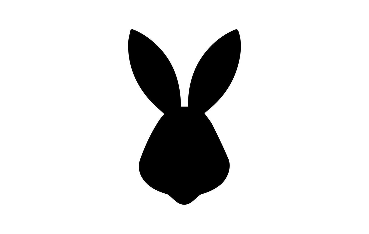 Silhouette of a rabbit head. Easter Bunny. Isolated on white background. A simple black icon of hare. Cute animal. Ideal for logo, emblem, pictogram, print, design element for greeting card, vector