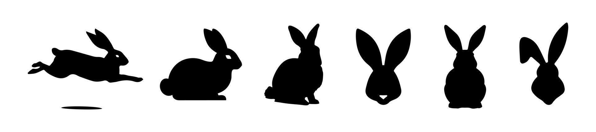 Set of Rabbit silhouettes. Easter bunnies. Isolated on white background. A simple black icons of hares. Cute animals. Ideal for logo, emblem, pictogram, print, design element for greeting card. vector
