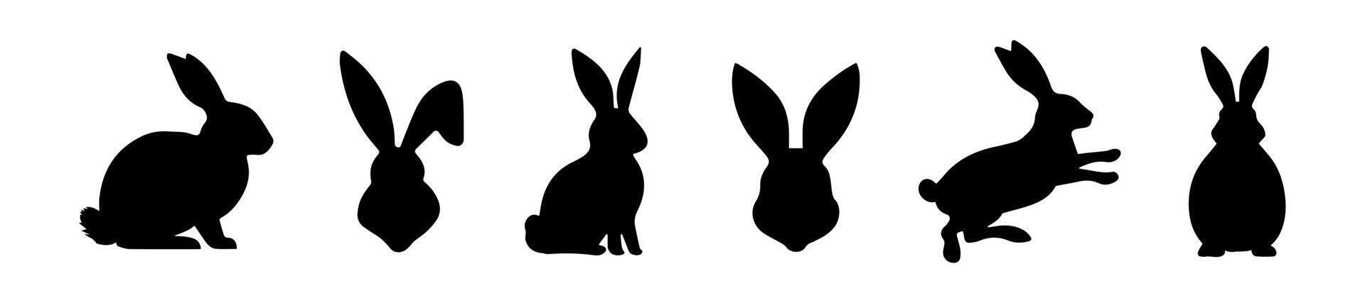 Set of Rabbit silhouettes. Easter bunnies. Isolated on a white background. A simple black icons of hares. Cute animals. Ideal for logo, emblem, pictogram, print, design element for greeting card. vector