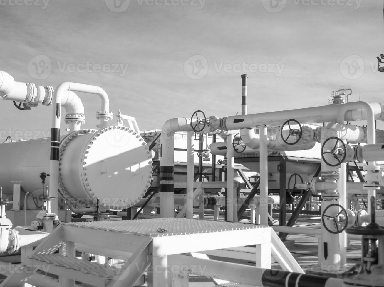Heat exchangers in a refinery. The equipment for oil refining photo