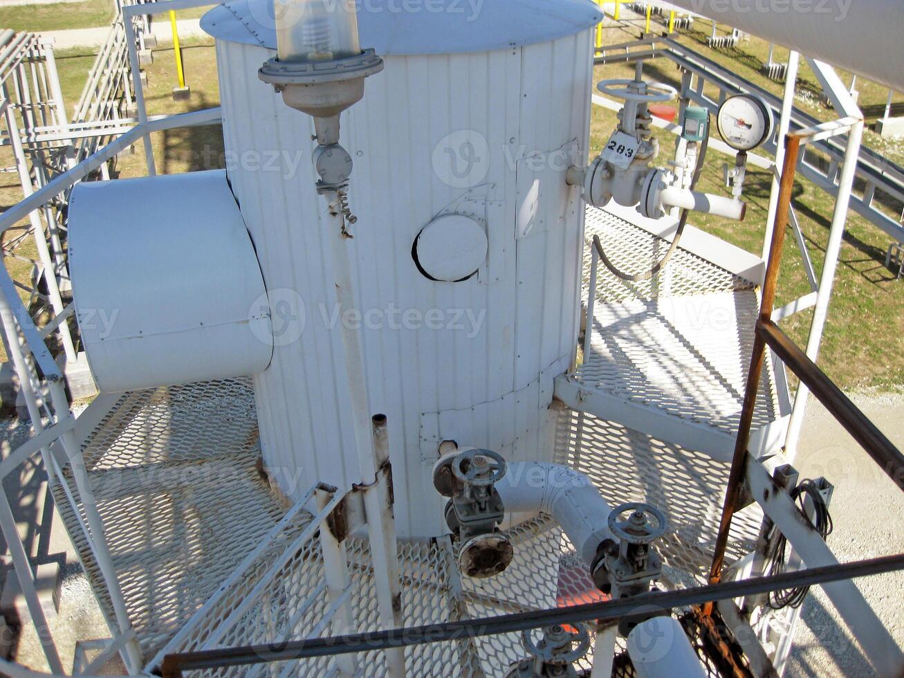 Technological columns of oil refinery. photo