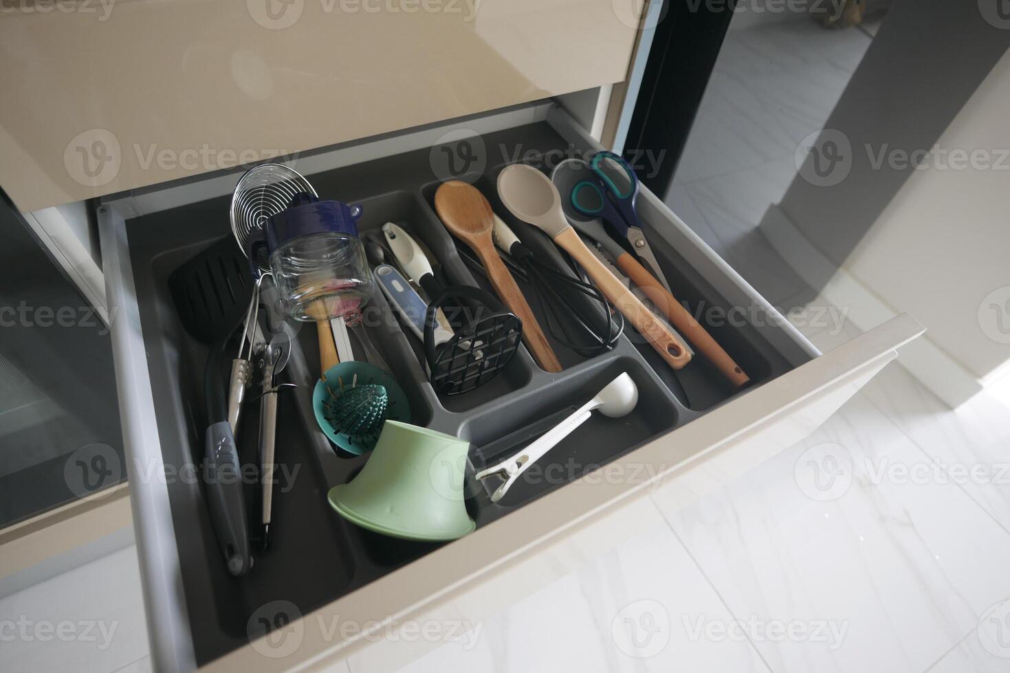 cutlery fork with knife and spoon in a drawer photo