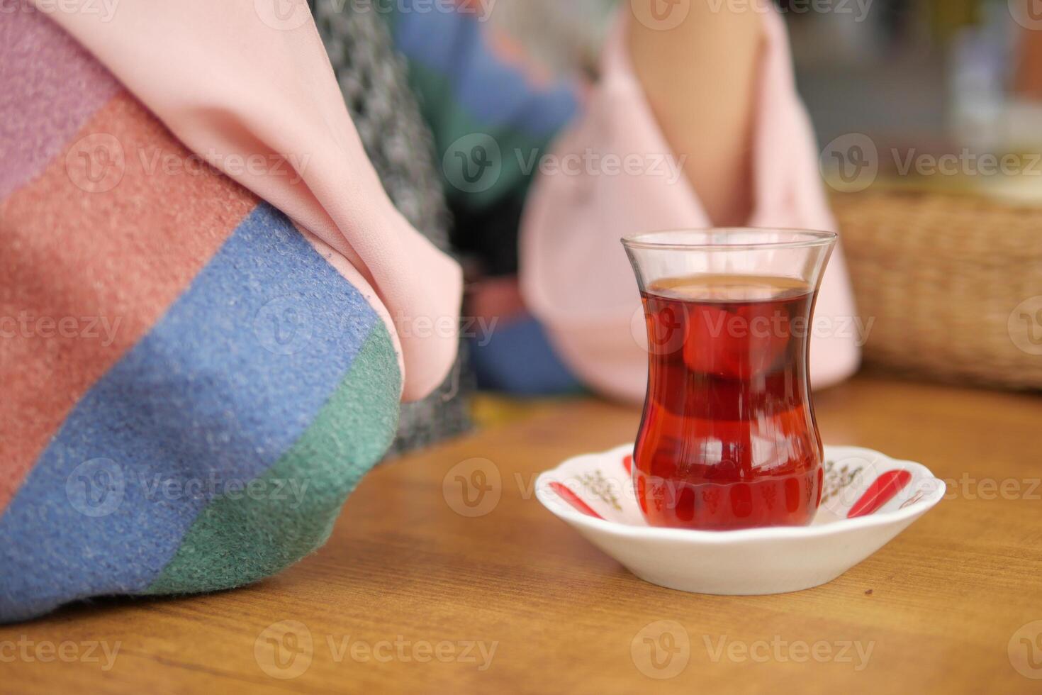 Traditional turkish tea on white table . photo