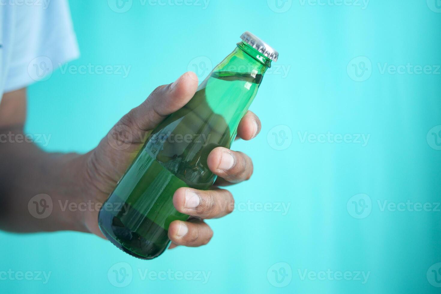 holding a soft soft drinks with copy space photo