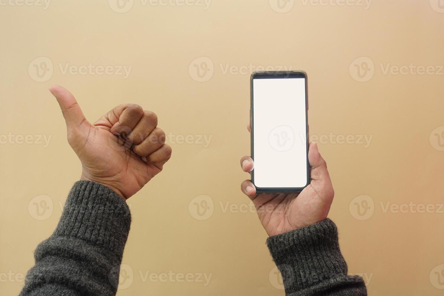 young man hand using smart phone with white screen photo