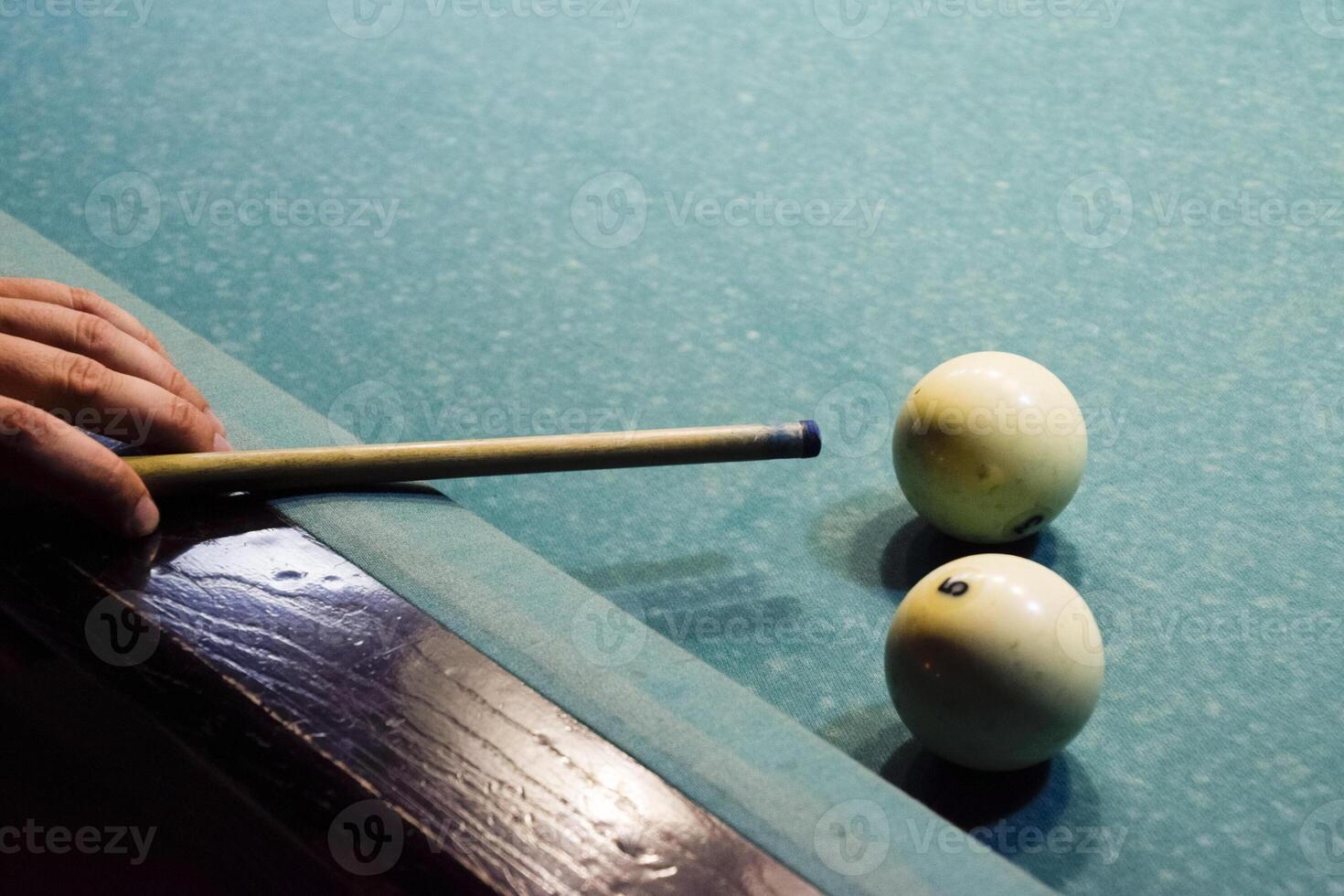 Billiards, billiard table. Targeting the cue in the ball for imp photo