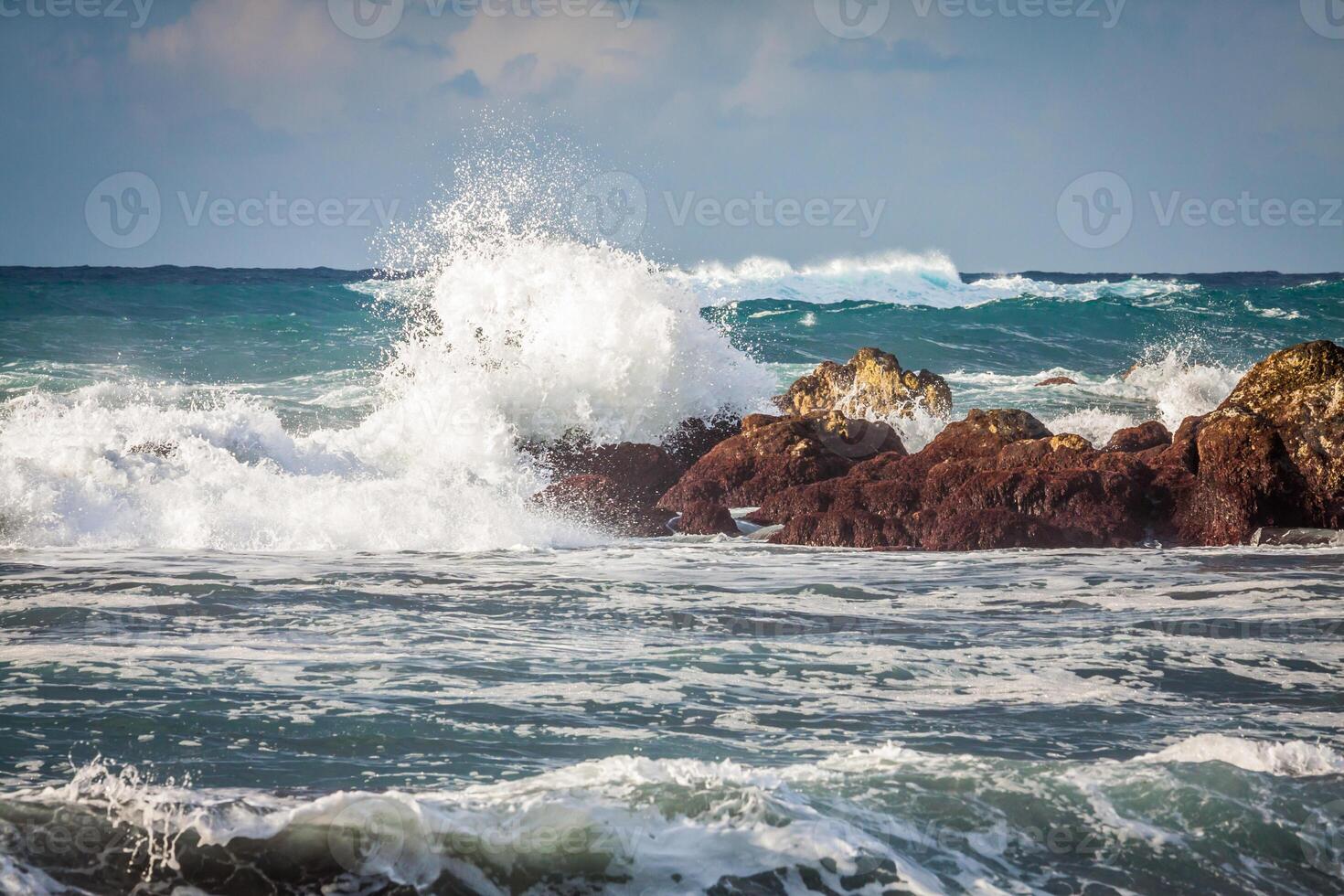 Powerful waves of Atlantic ocean near Tenerife coast, focus on waves photo