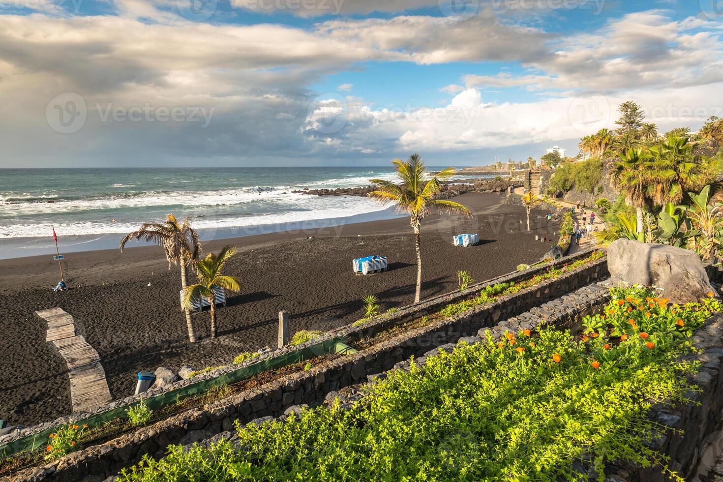 The coast of Atlantic ocean in Puerto De La Cruz, one of the most popular touristic towns, Canary islands, Spain photo