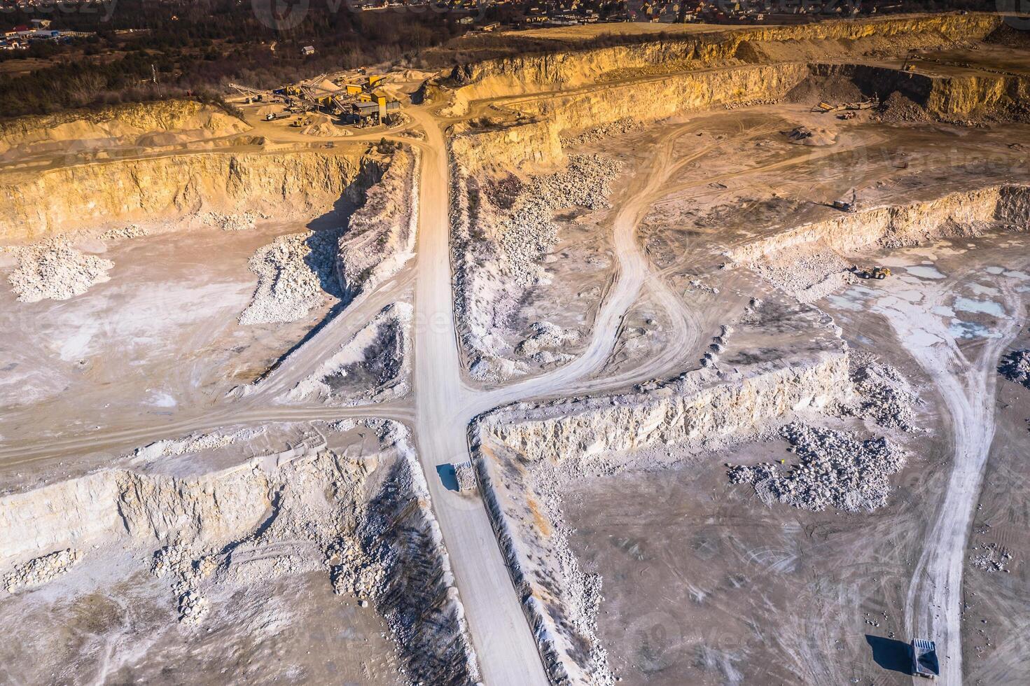 Aerial view of opencast mining quarry. Industrial place view from above photo