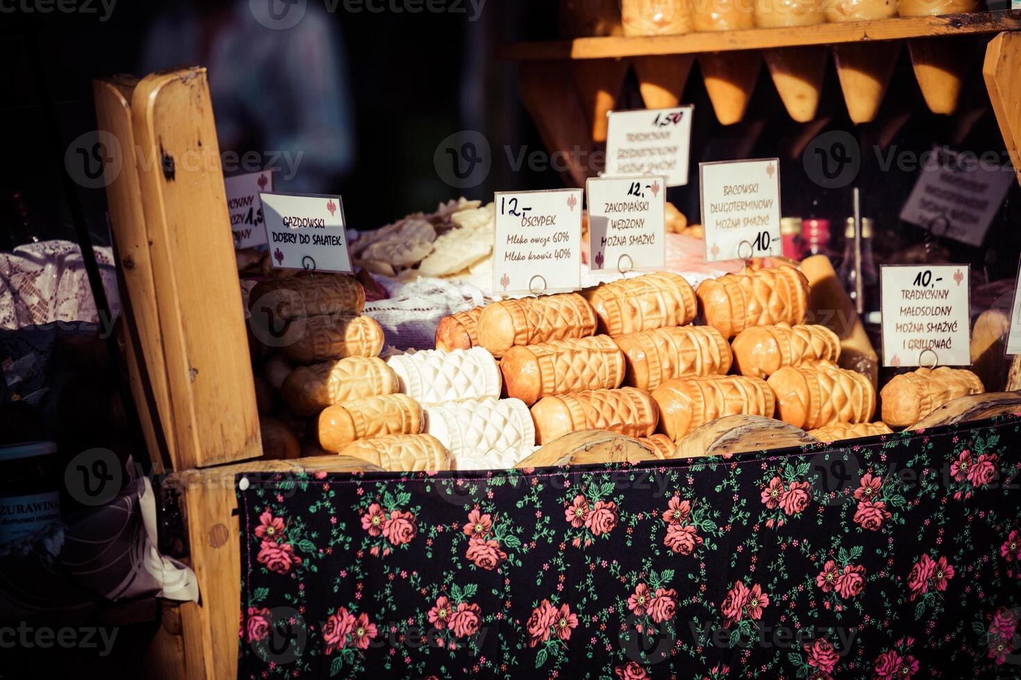 Traditional polish smoked cheese oscypek on outdoor market in Zakopane photo