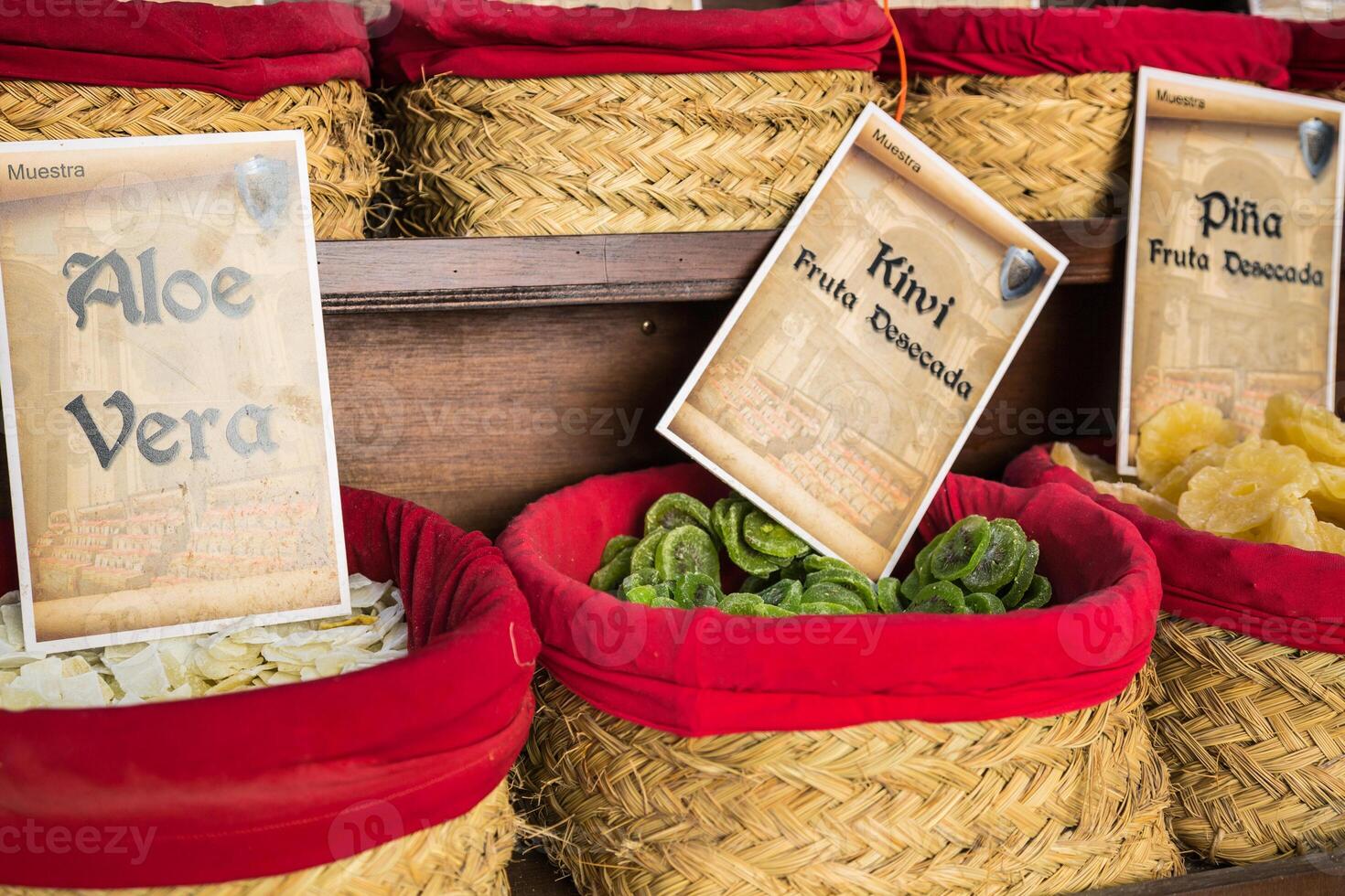 Spices, seeds and tea sold in a traditional market in Granada, Spain photo