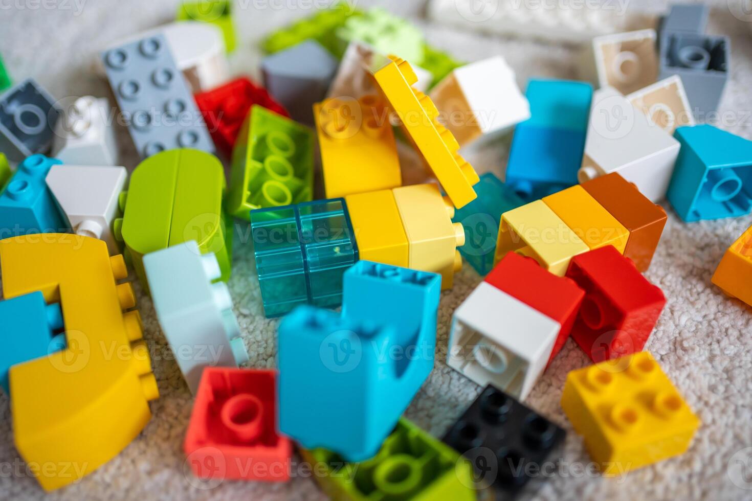 Closeup of colorful toy building blocks for children photo
