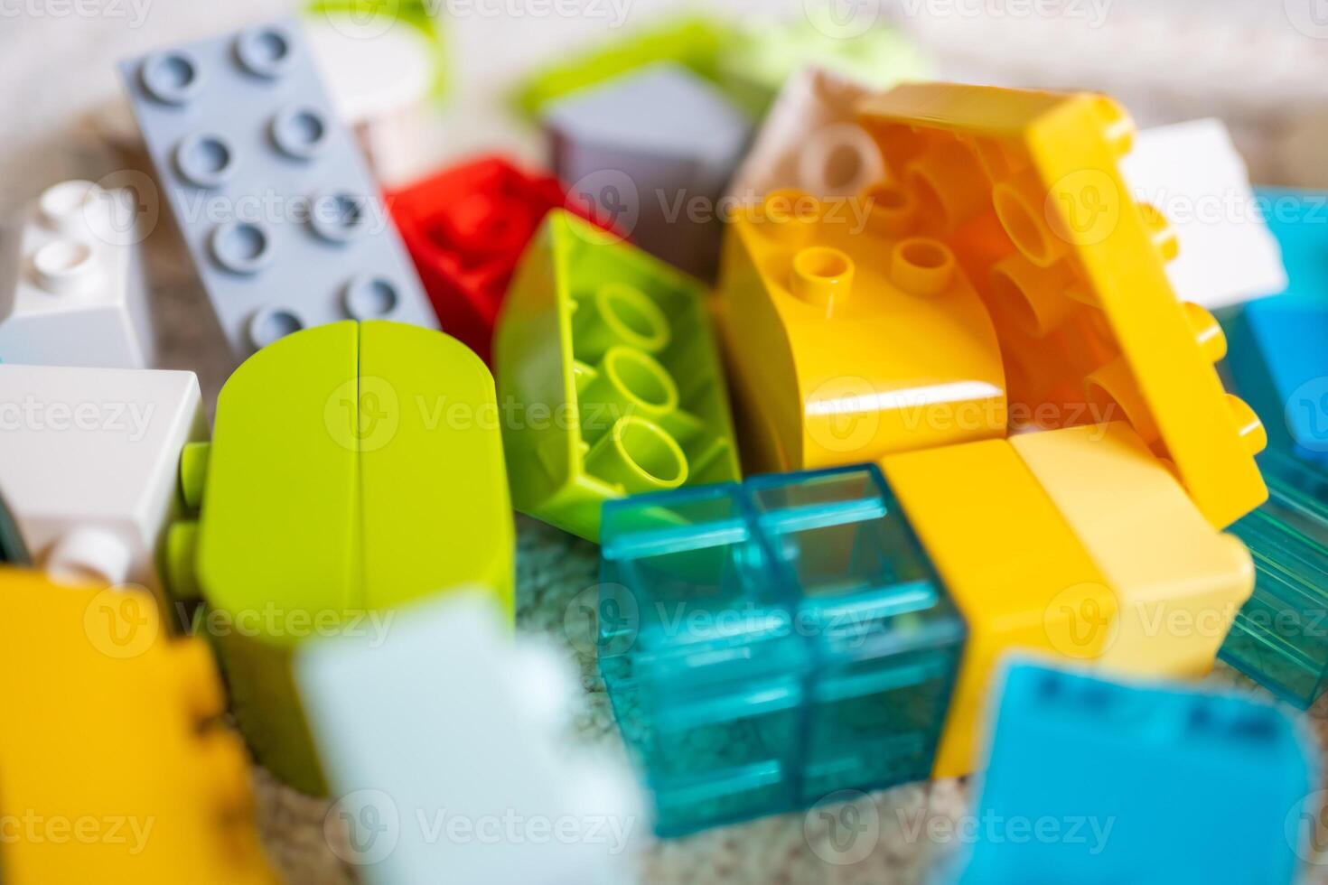 Closeup of colorful toy building blocks for children photo