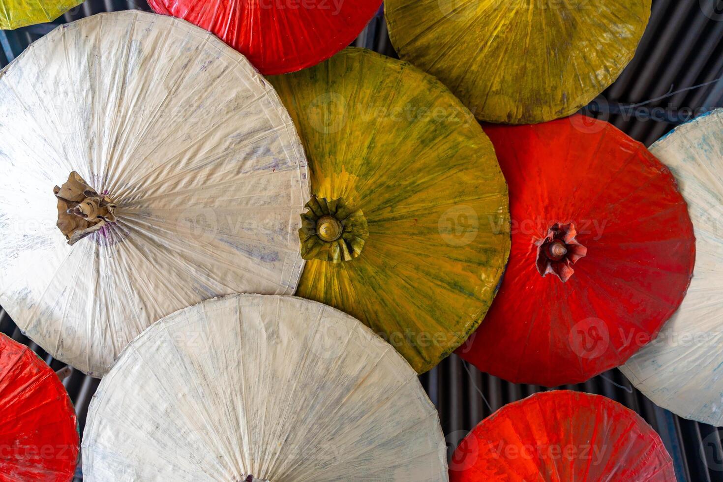 Japanese Style Colorful Umbrellas in floating open air market on the pond in Pattaya, Thailand photo