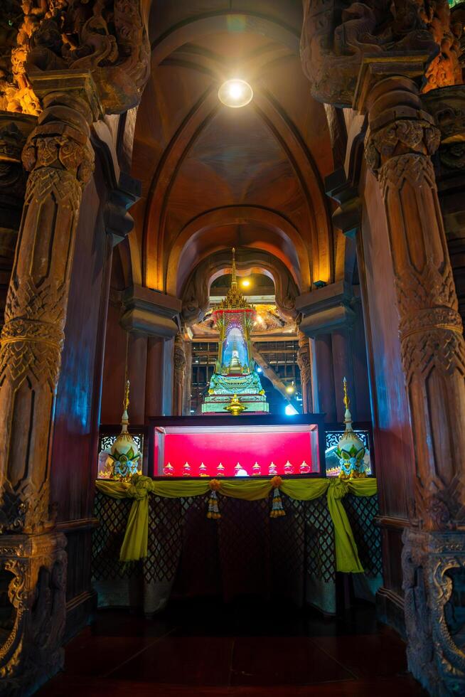 Pattaya, Thailand - December 31, 2023. Interior of Sanctuary of Truth wooden temple in Pattaya, Thailand. Sanctuary of Truth temple. photo