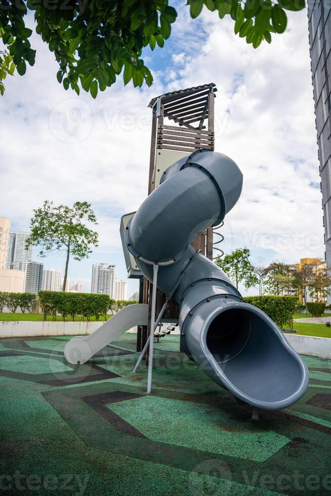 Playground on roof of one of building in Georgetown, Malaysia, concept for fun and safety of children. photo