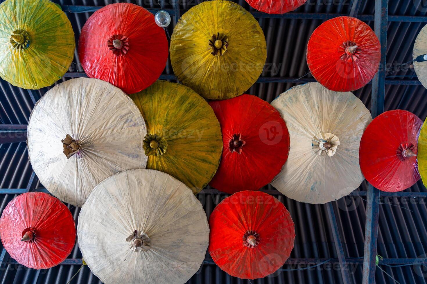 Japanese Style Colorful Umbrellas in floating open air market on the pond in Pattaya, Thailand photo