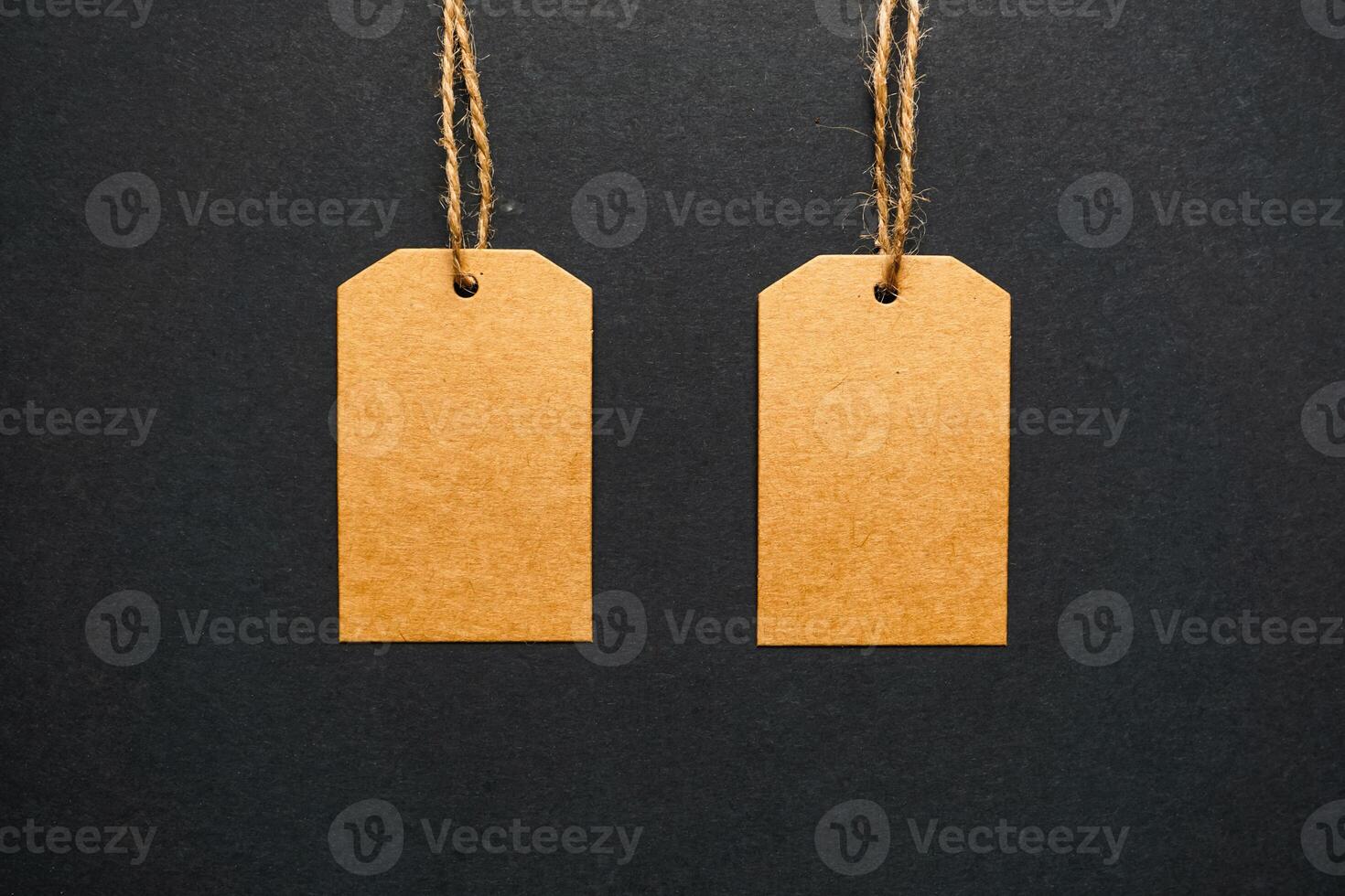 golden price tag on the black background, golden mockup photo