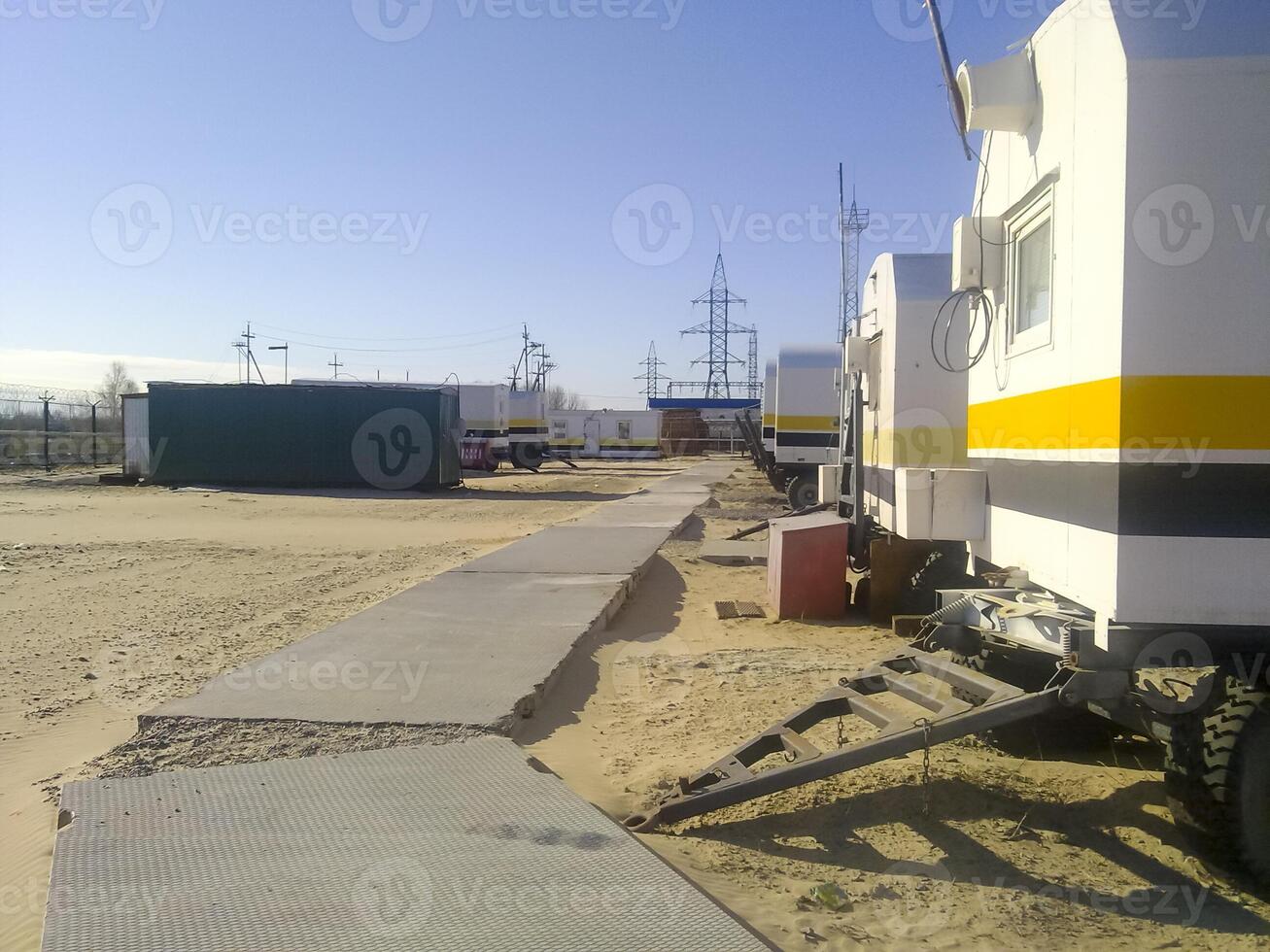 Residential trailers for shift workers in the oil field. The car-house. Residential infrastructure for oil workers for rest outside working hours. photo