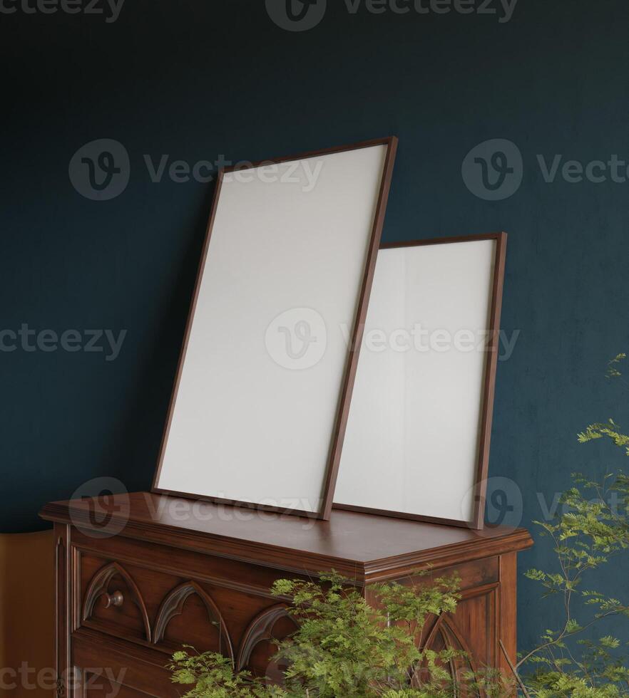 a couple of frame mockup poster leaning on the blue concrete wall above the wooden drawer in the living room with plant decor photo