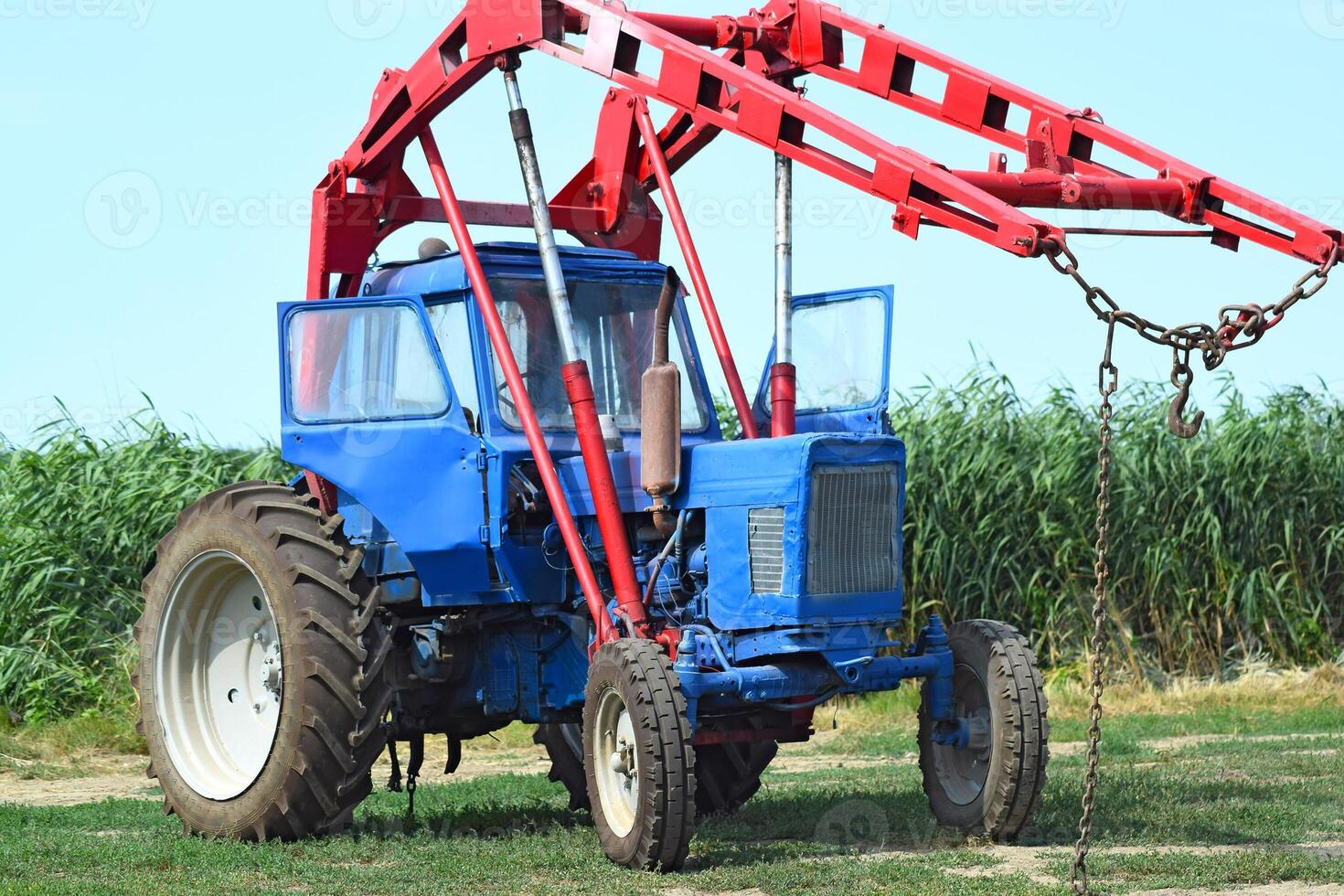 Tractor to collect hay photo