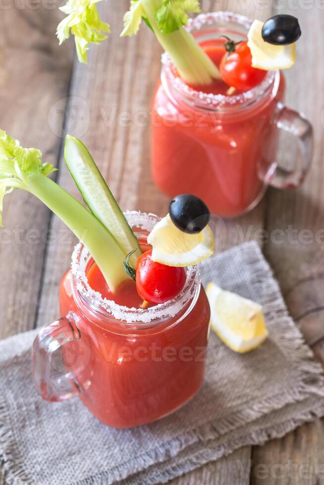 Tomato juice in the mason jars photo