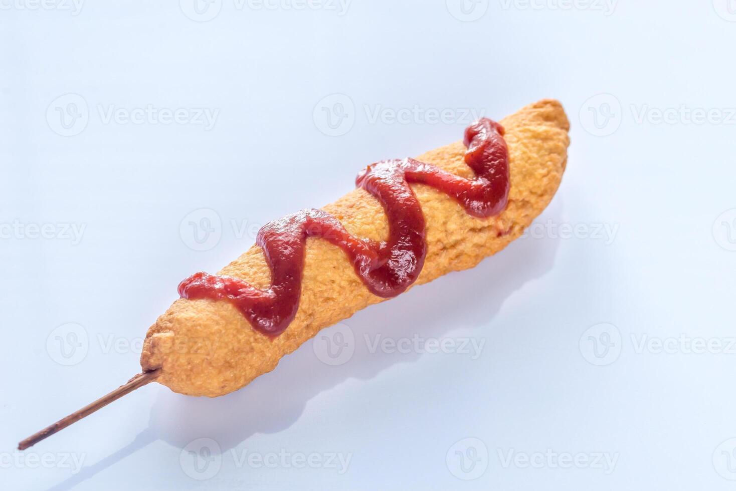 Corn dog on the white background photo