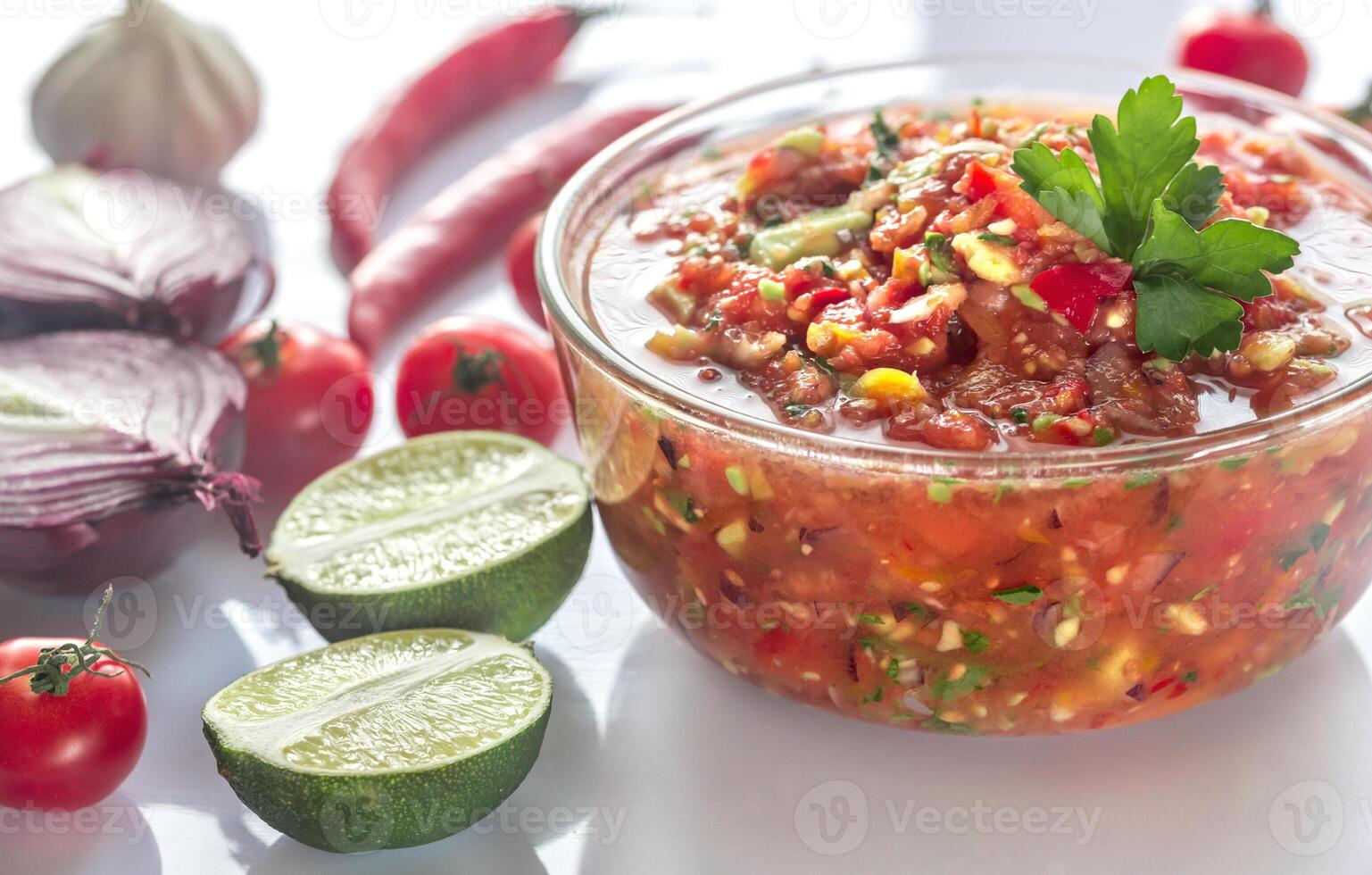 Bowl of salsa with ingredients photo