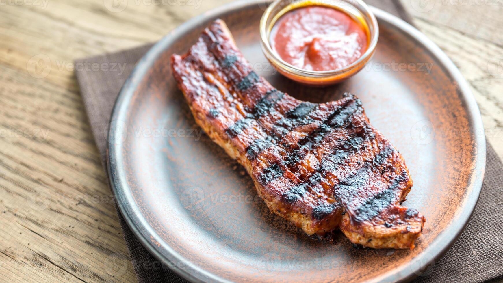 Portion of grilled pork ribs photo