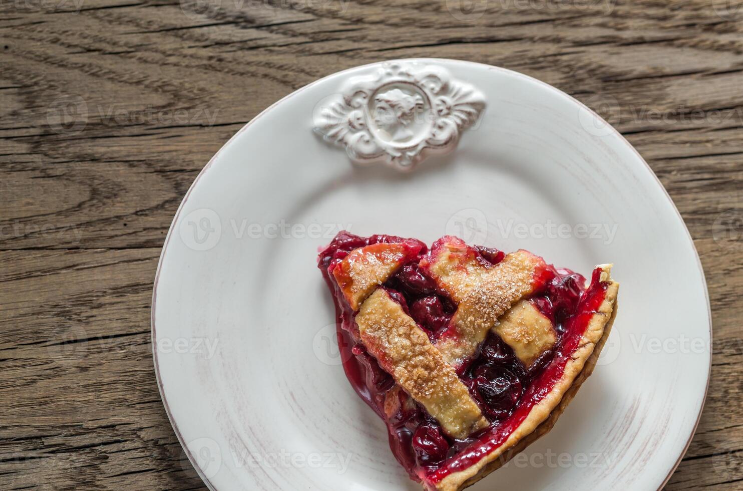 Cherry pie on the plate photo