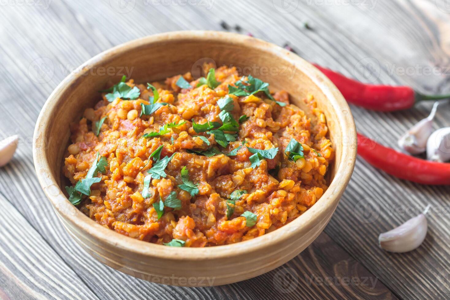 Bowl of red lentil curry photo