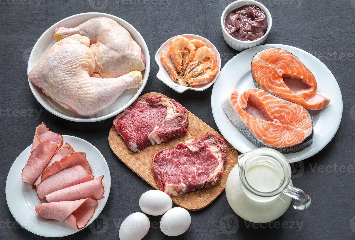 Protein diet raw products on the wooden background photo